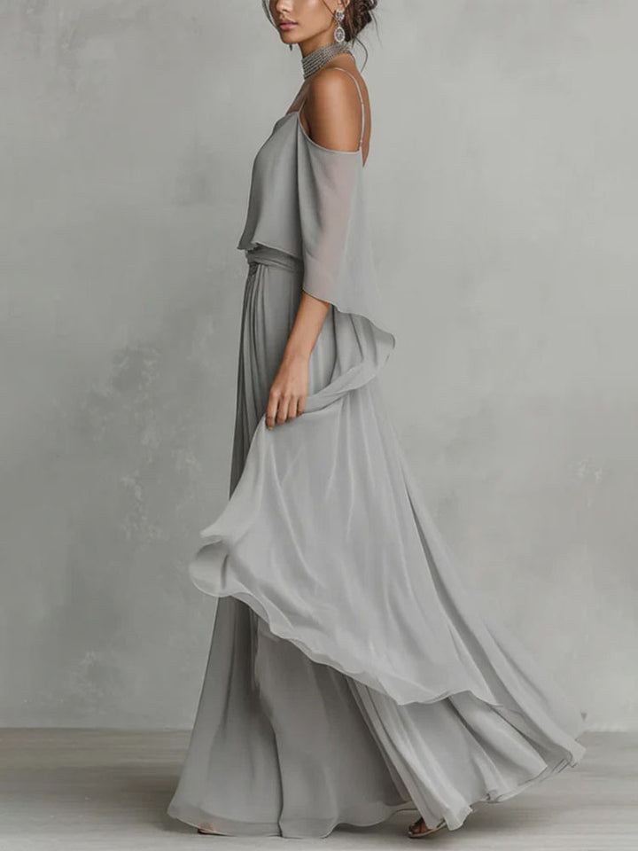 A halter-neck off-shoulder top and asymmetrical wide-leg pants set