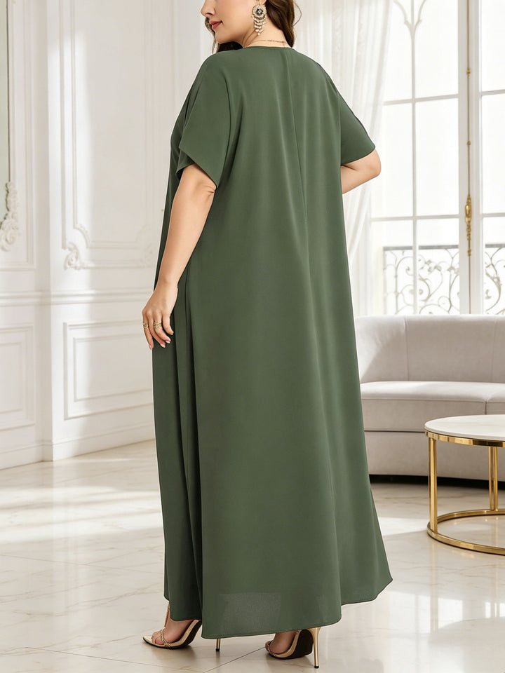 Plus-size V-neck dress with leaf embroidery