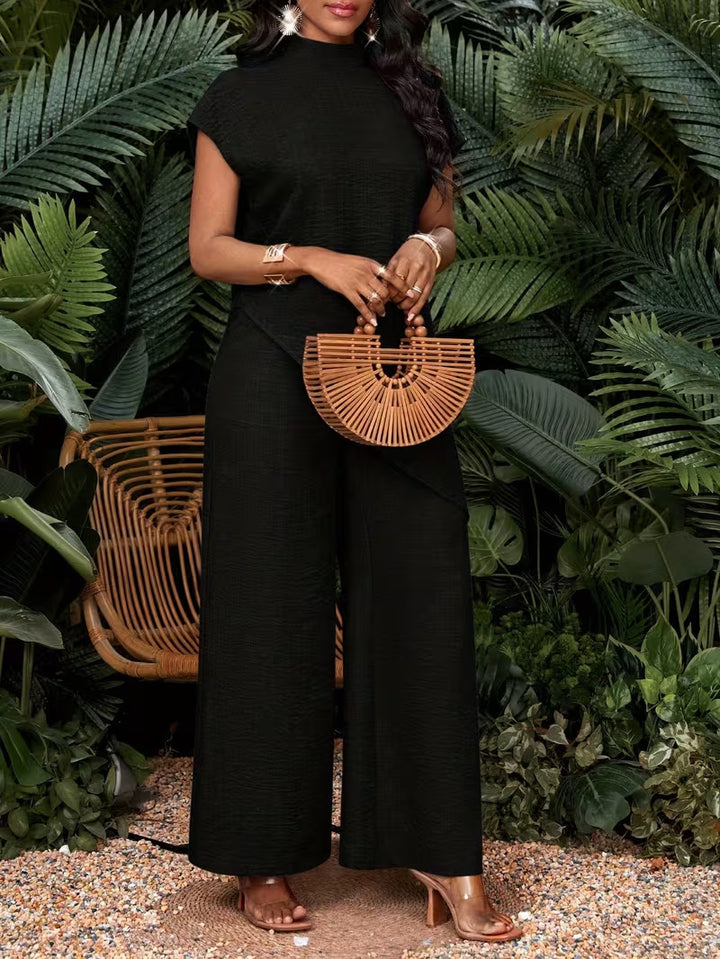 Solid-color asymmetric hem top