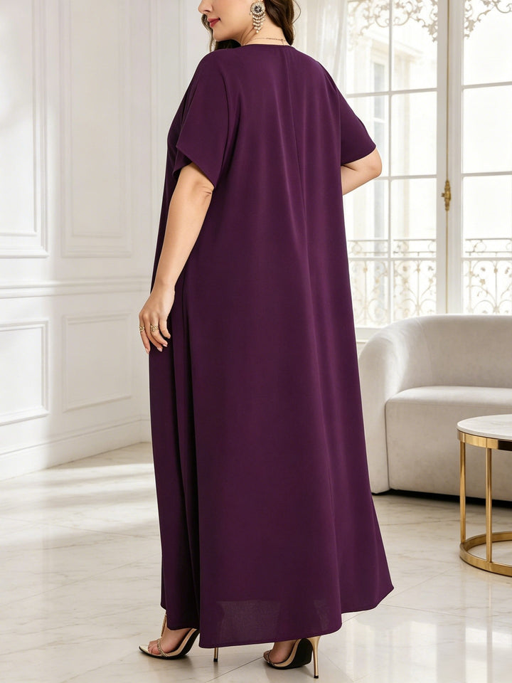 Plus-size V-neck dress with leaf embroidery
