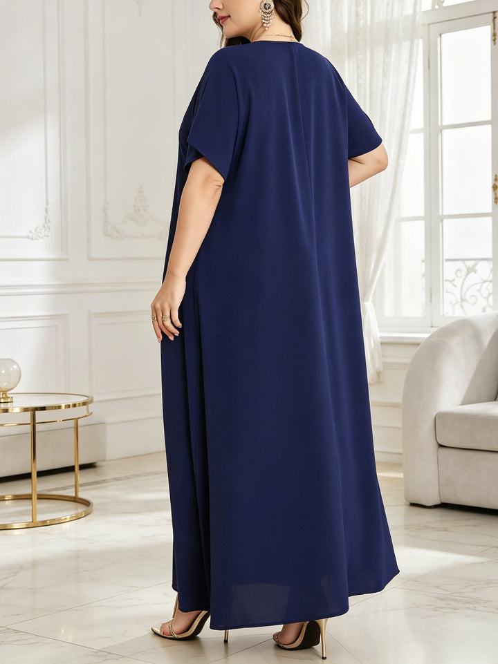 Plus-size V-neck dress with leaf embroidery