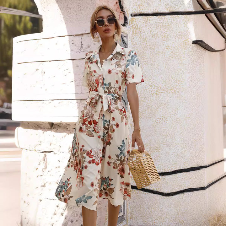 Waist-cinching single-breasted printed short-sleeved dress