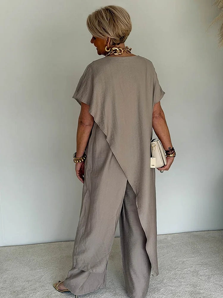 Two-piece set: loose-fitting, slit-front, belted top and wide-leg pants