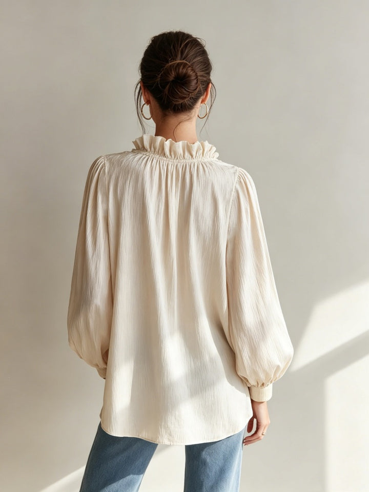 Loose-fit ruffled V-neck puff-sleeve shirt