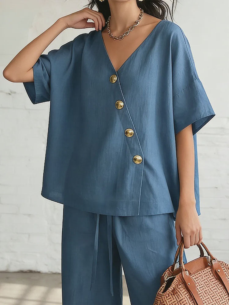 Short-sleeved diagonally buttoned top and drawstring wide-leg pants set