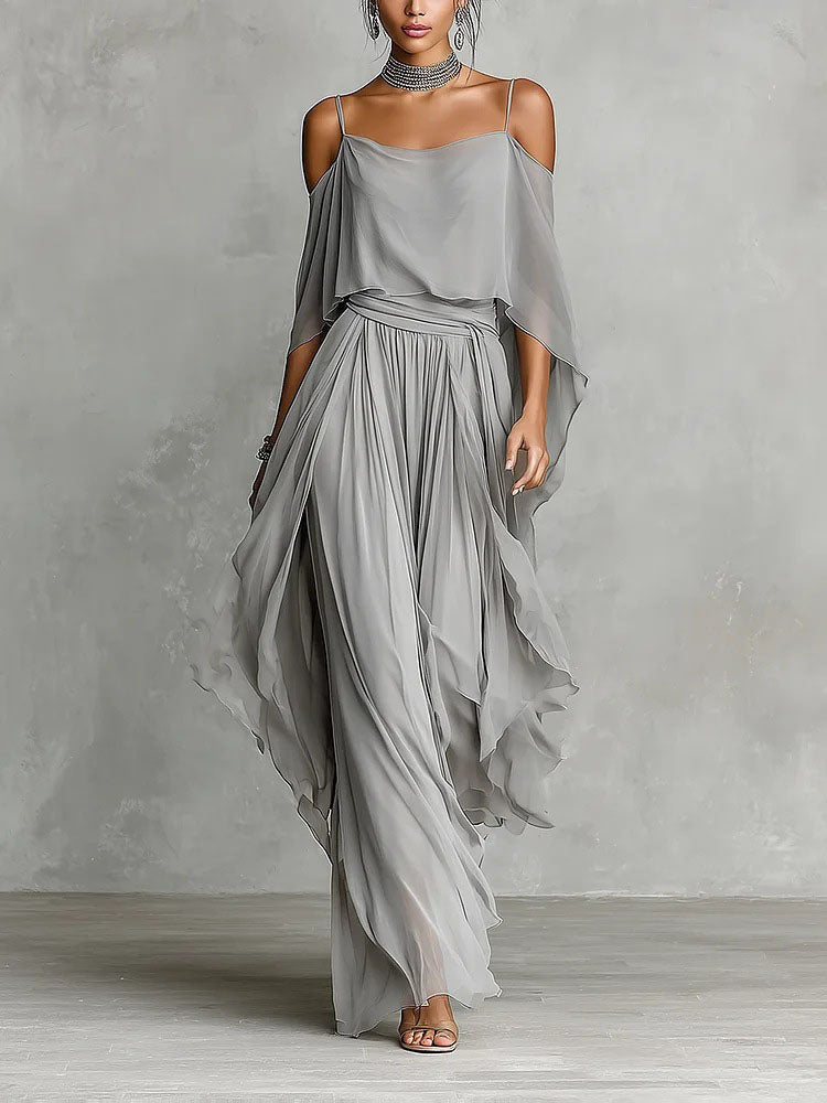 A halter-neck off-shoulder top and asymmetrical wide-leg pants set