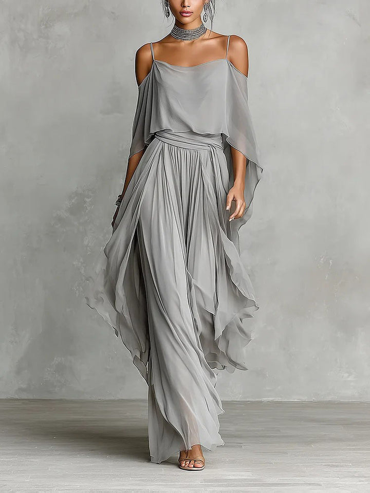 A halter-neck off-shoulder top and asymmetrical wide-leg pants set