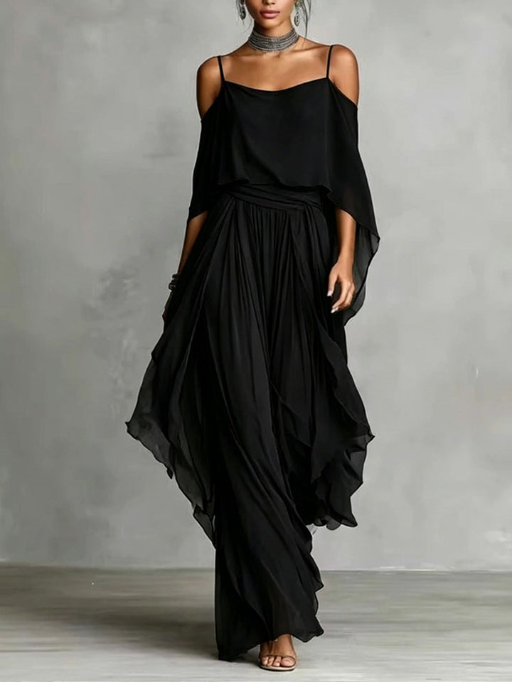 A halter-neck off-shoulder top and asymmetrical wide-leg pants set