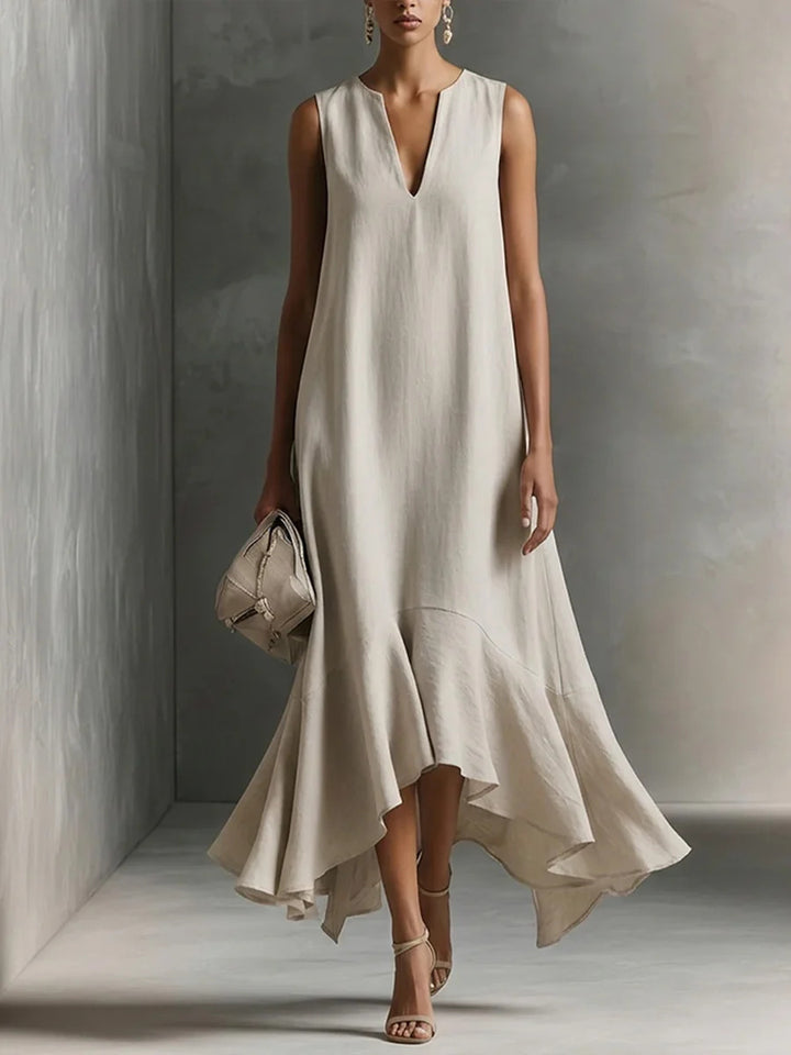 Deep V-neck sleeveless dress with an asymmetrical hem, elegant and slimming